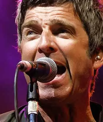Close-up of Noel Gallagher performing at Kendal Calling Festival during IMAG coverage directed by John Surdevan